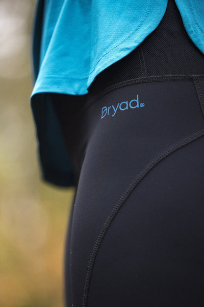 Load image into Gallery viewer, Chloe is wearing Dryad's Gwen running tight, made from second-life fibres.