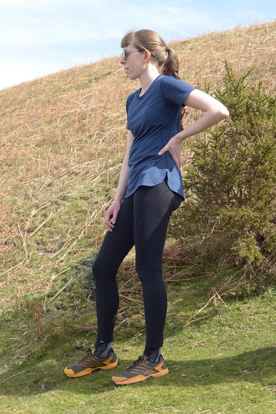 Load image into Gallery viewer, Briony is wearing Dryad&#39;s Gwen running tight, made from second-life fibres.
